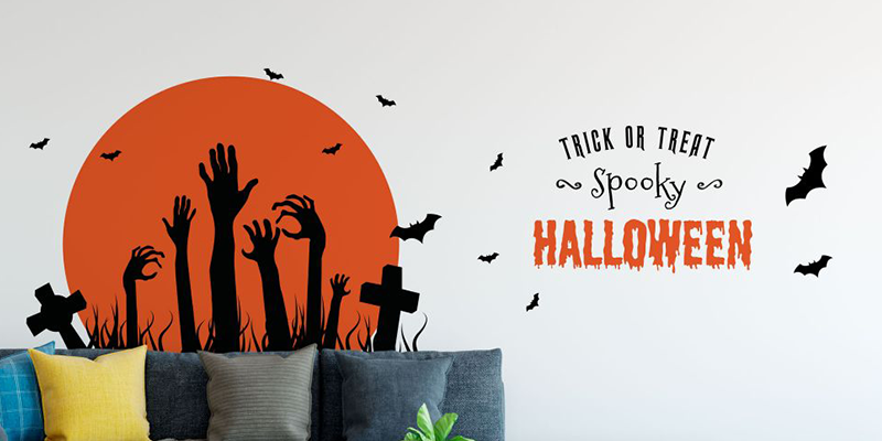 Halloween wall stickers featuring a graveyard scene with rising hands, full moon, bats, and "Trick or Treat" text, perfect for spooky decor.