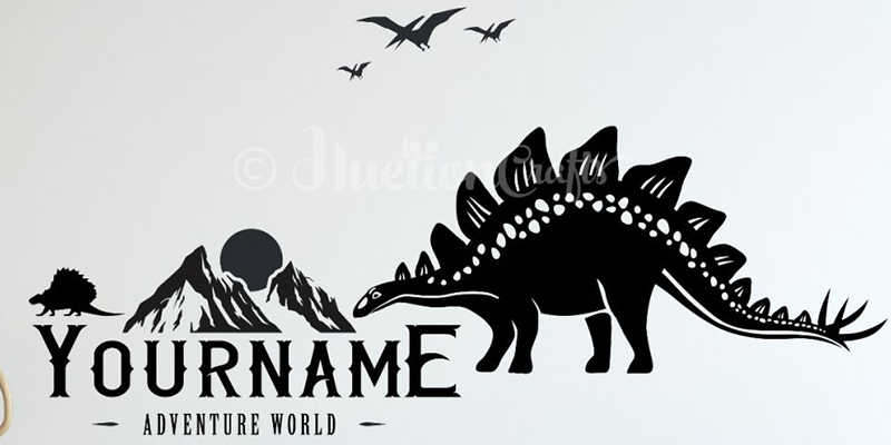 Dinosaur wall decal featuring a Stegosaurus, mountains, and customizable name text, perfect for creating a personalized adventure theme.