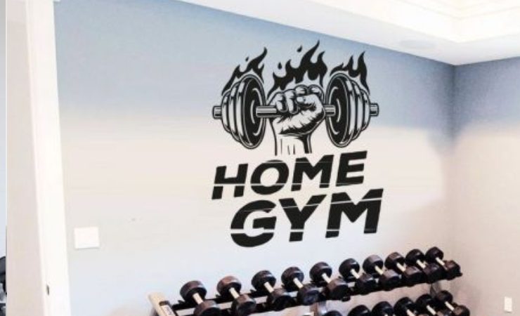 Removable wall stickers with gym-themed motivational quotes and weightlifting icons, perfect for enhancing a home gym setup.