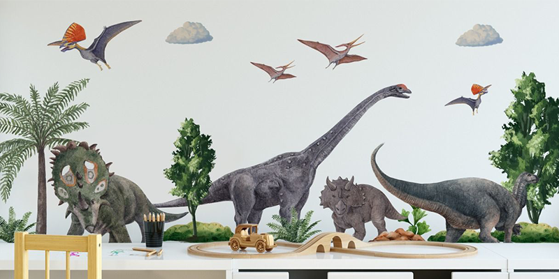 Kids room wall decals with dinosaurs, trees, and flying pterosaurs, creating a fun prehistoric theme for playful decor.