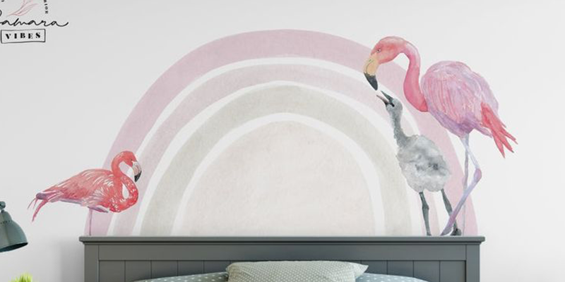 Best wall decal featuring two flamingos and a soft rainbow, adding a tropical and calming vibe to bedroom decor.