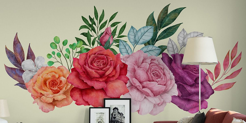 Vibrant floral wall decals featuring large roses in shades of orange, pink, and purple with green leaves for a lively decor touch.