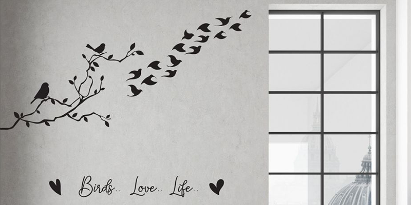 Birds wall sticker featuring a flock flying from a branch with the quote "Birds Love Life" in decorative script below.