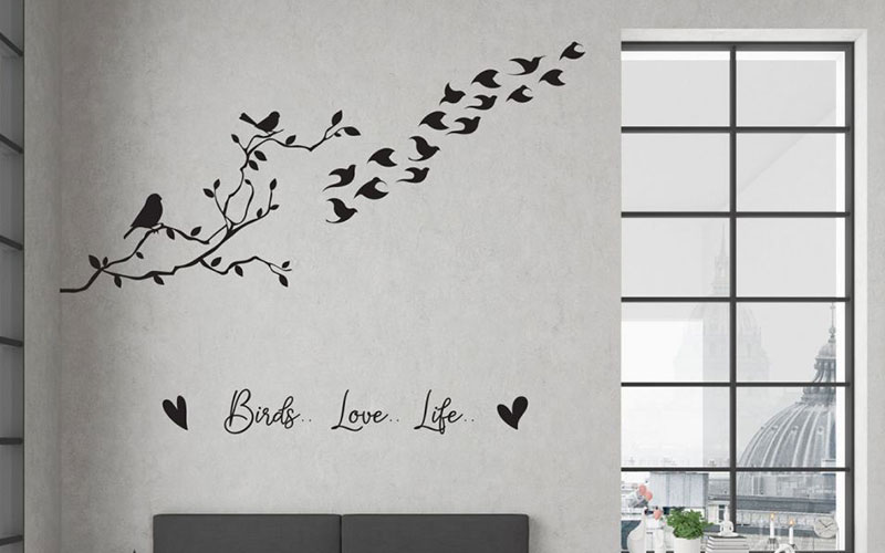 Birds wall sticker featuring a flock flying from a branch with the quote "Birds Love Life" in decorative script below.