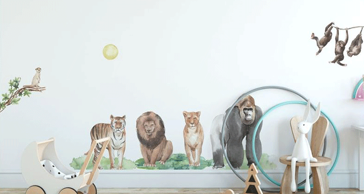 Nursery wall sticker featuring a tiger, lion, lioness, and gorilla under the sun, creating a vibrant jungle scene.