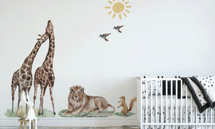 Nursery wall sticker with giraffes, lion, and birds under a sun, creating a safari scene perfect for a baby's room.