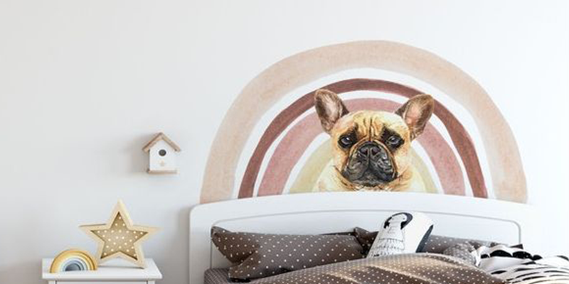 Wall stickers for bedroom featuring a cute French bulldog illustration with a soft rainbow backdrop above a bed.