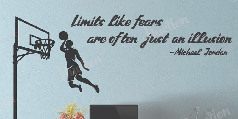 Boys room wall decal featuring a basketball player dunking with the quote, "Limits like fears are often just an illusion."