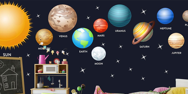 Bright solar system wall stickers featuring planets, the sun, and stars create a fun, educational space theme on nursery walls.