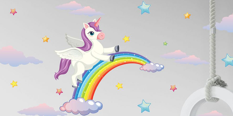 Colorful unicorn and rainbow wall stickers with stars and clouds add a whimsical, magical touch to a girl's room decor.
