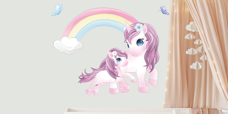 Unicorn wall sticker featuring a mother and baby unicorn with purple manes under a pastel rainbow, ideal for kids' room decor.