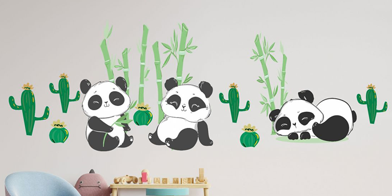 Cute animal wall stickers featuring playful pandas surrounded by bamboo and cacti, perfect for adding charm to a kids' room.