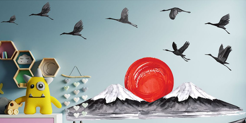 A children's room wall features cute animal wall stickers beside a mural of flying birds, mountains, and a red sun.