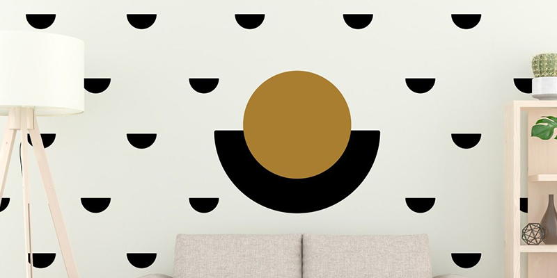Boho wall decals featuring a bold geometric pattern with black semicircles and a large mustard circle, adding a modern touch.