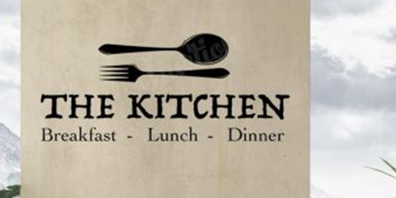 Kitchen wall decal featuring a spoon and fork above the text "The Kitchen" with "Breakfast - Lunch - Dinner" below.