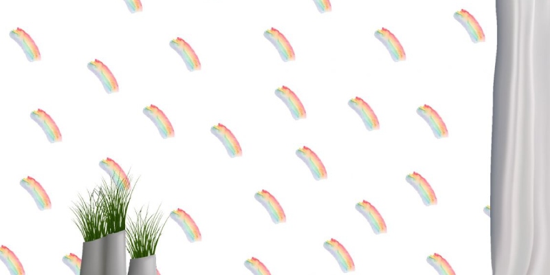 Minimalist rainbow wall decals in a scattered pattern, ideal for adding a soft, playful touch to any room.